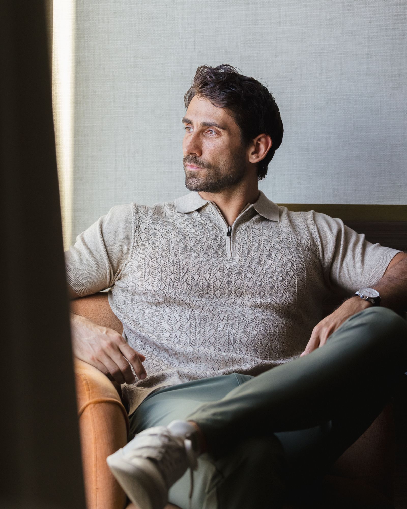 Guest seated in the window light at The Westin Cleveland